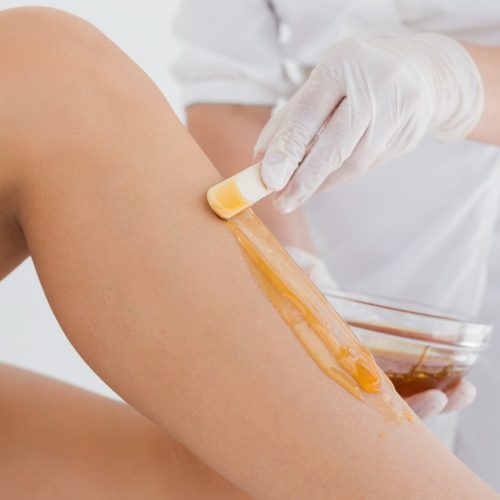 A Lady getting Wax on her legs | Spa Vela in Flower Mound, Texas